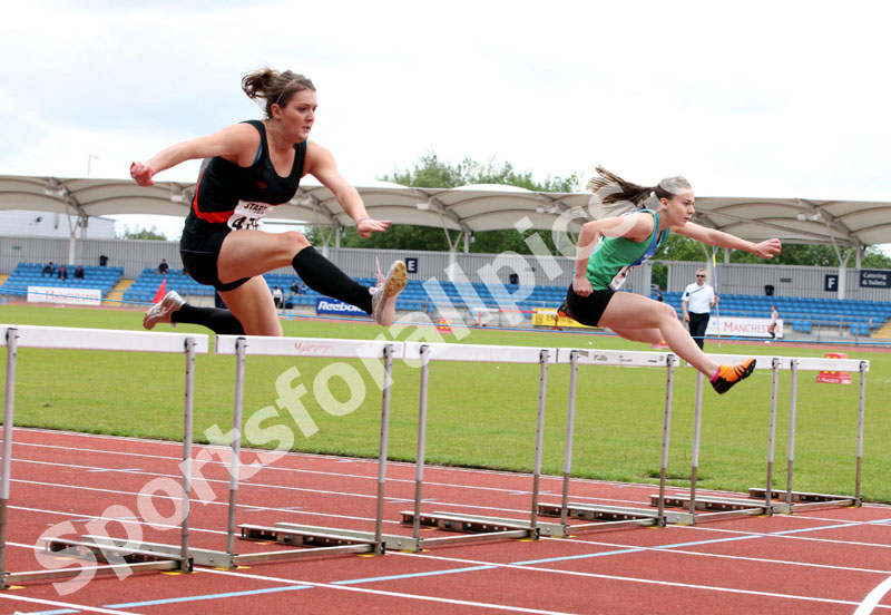 Micaela Brindle (Wigan Harriers) and far right Kelly Clark (City of Sheffield)  winner of the under-20 100 metres hurdle, Northern Championships, Sport City, Manchester